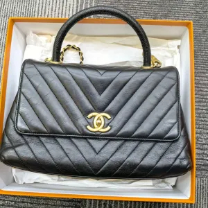 Chanel Preloved Coco Top Handle Bag in Black Quilted Leather