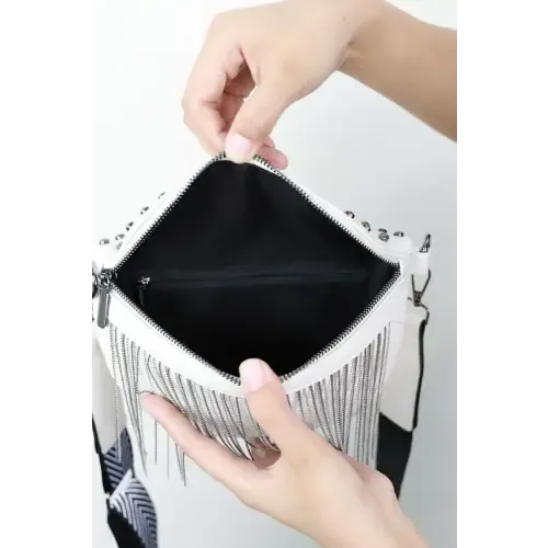 Edgy Leather Studded Sling Bag with Fringe Flair