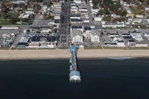 Photo - An October 2017 aerial view of Old Orchard Beach and its amusement park and lengthy pier on the southern Maine coast along the Atlantic Ocean- Fine Art Photo Reporduction 12in x 08in